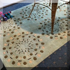 D84. Contemporary green rug. 7'10” x5'3” - $125